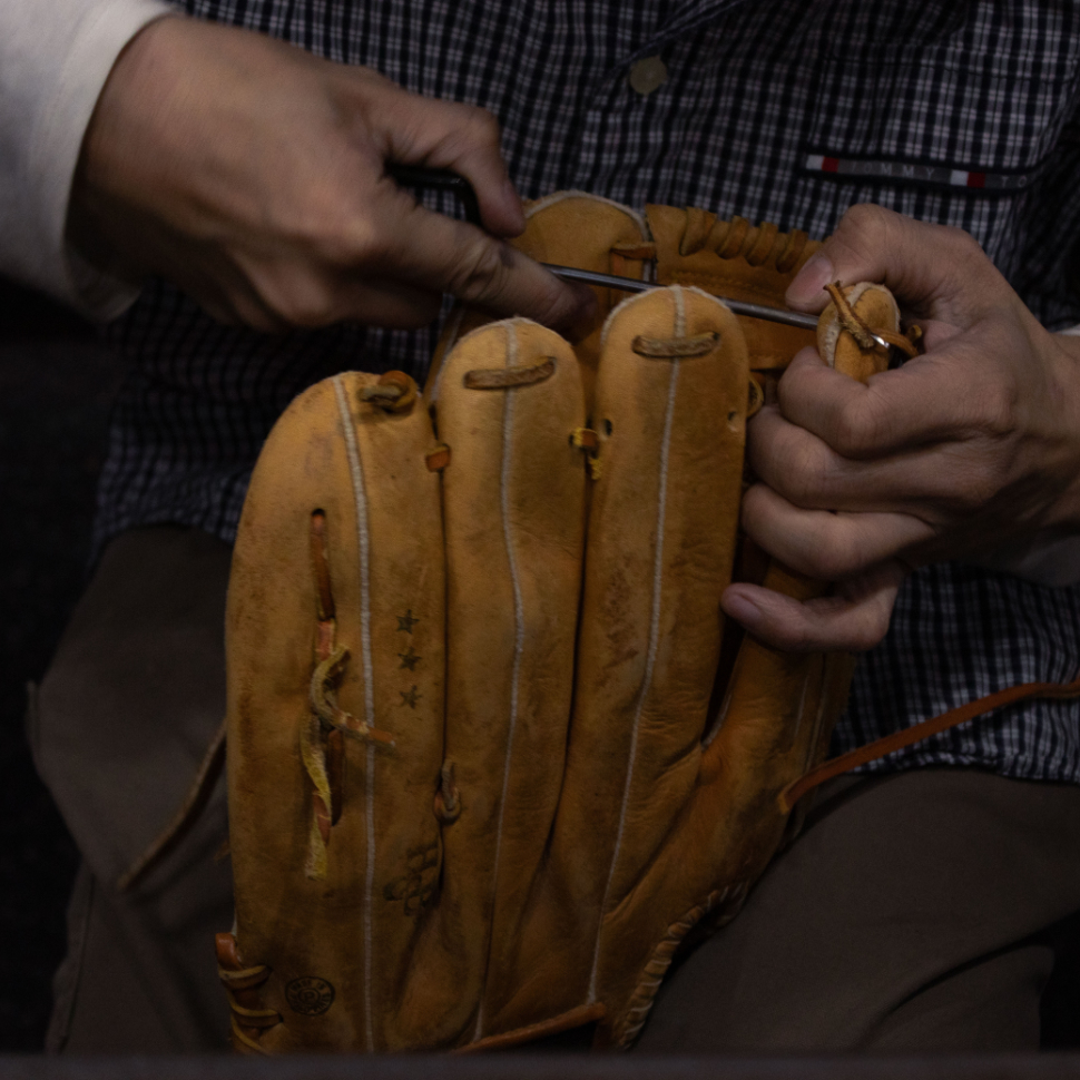 baseball glove getting re-laced